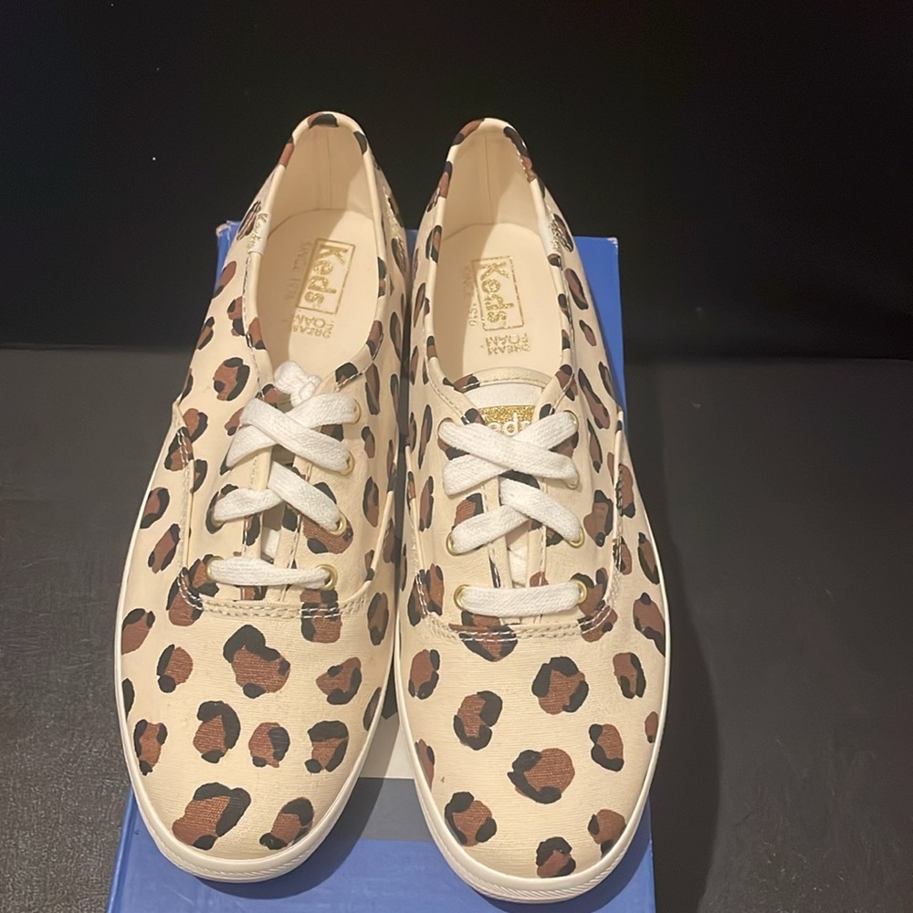 Women’s leopard keds with gold finishings. Brand new.